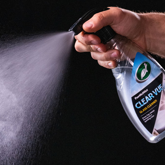 Turtle Wax Clear Vue Glass Cleaner Spray, spraying in the air. Great for a sparkling clean finish.