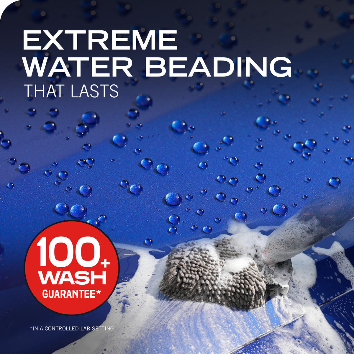 A close-up of a dark blue vehicle surface with water droplets and foam from a washing brush, with large text reading 'EXTREME WATER BEADING THAT LASTS' and a red badge that says '100+ WASH GUARANTEE'.