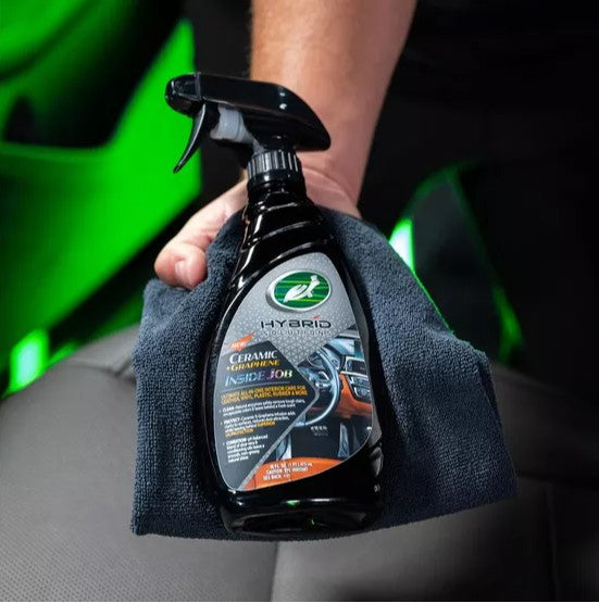 Turtle Wax ceramic graphene inside job spray for car detailing, held with a grey cloth. Car care product. भारत में कार की सफाई.
