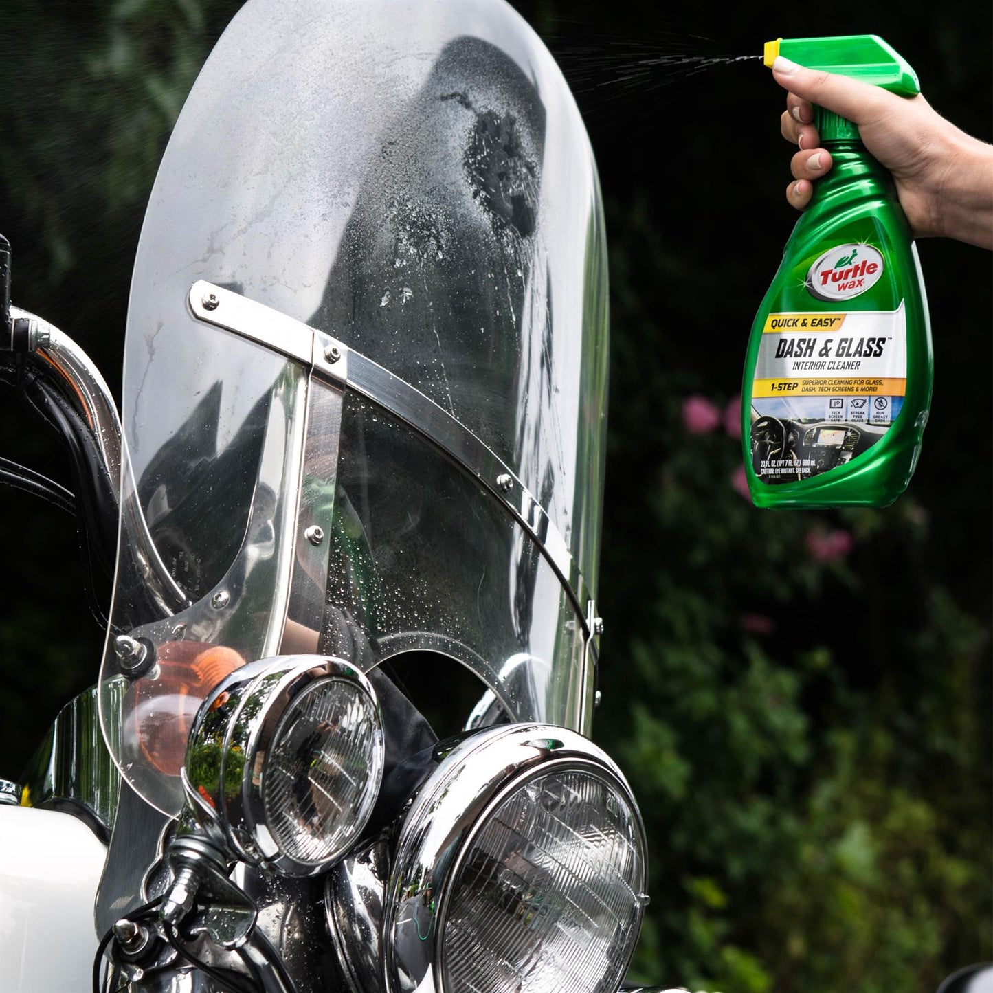 Turtle Wax: Bike windshield getting a spray. Interior cleaner being used. Detailing for your vehicle.