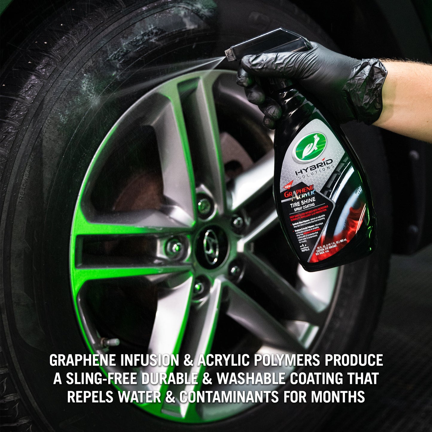 Turtle Wax Hybrid Graphene Acrylic Tire Shine spray being applied. Car detailing product for deep, dark shine in India.