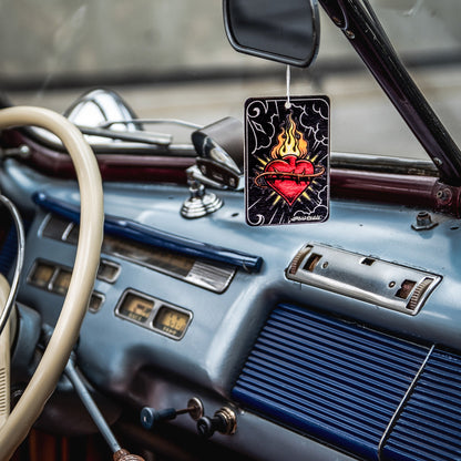 Sacred Heart paper freshener inside a classic Indian car. Vintage auto interior.  Car accessories, decorative.