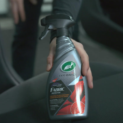 Turtle Wax Hybrid Solutions fabric protector: stain repelling, hydrophobic barrier for car interiors & upholstery.