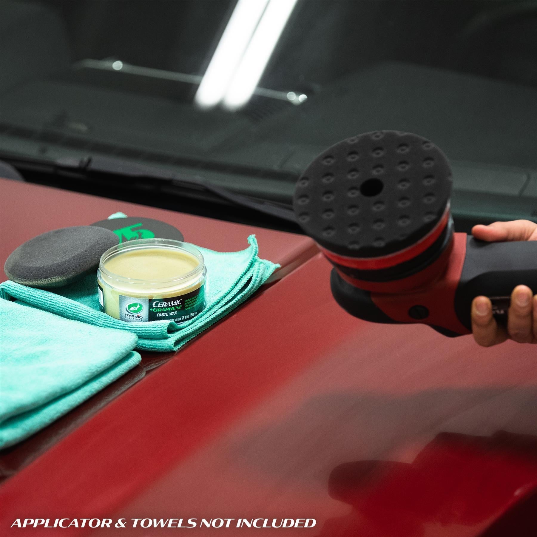 Turtle Wax Hybrid Solutions Ceramic + Graphene Paste Wax for car care on a red surface with a buffer, ideal for Diwali cleaning in India.