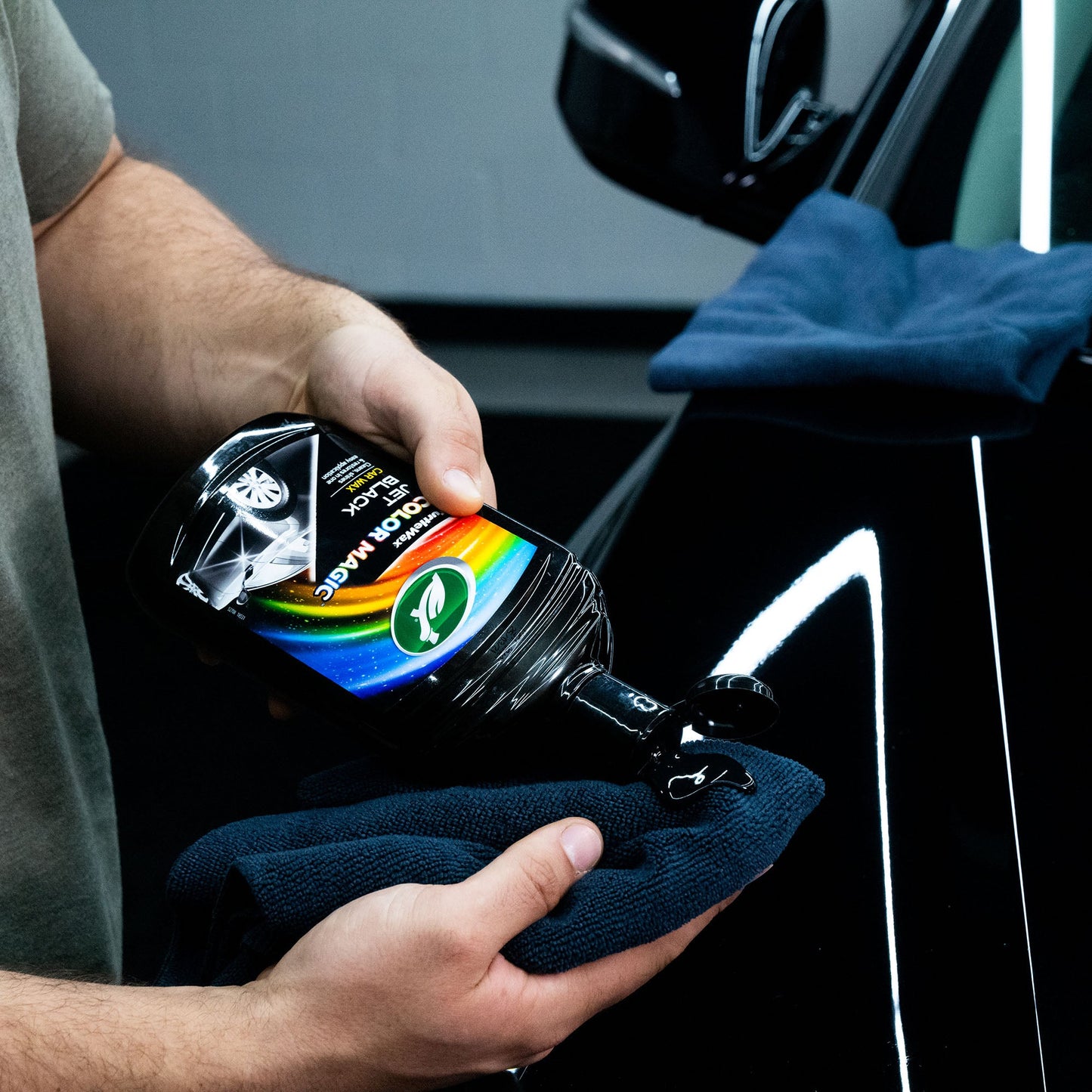 Turtle Wax Color Magic Jet Black Car Wax for black vehicles, man applying to cloth. Car care in India.