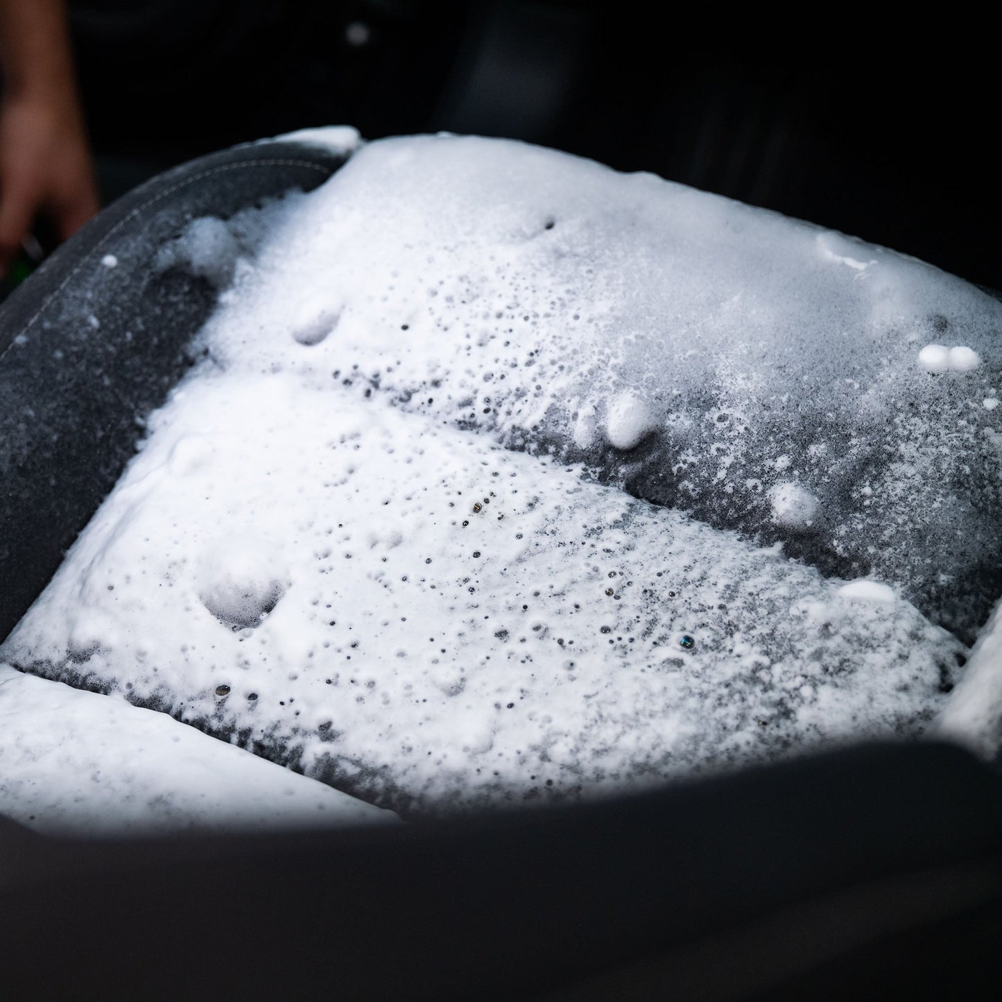 Upholstery cleaning with foam. Effective stain removal, deep cleansing. Restore your auto interiors, India. Turtle Wax car care.