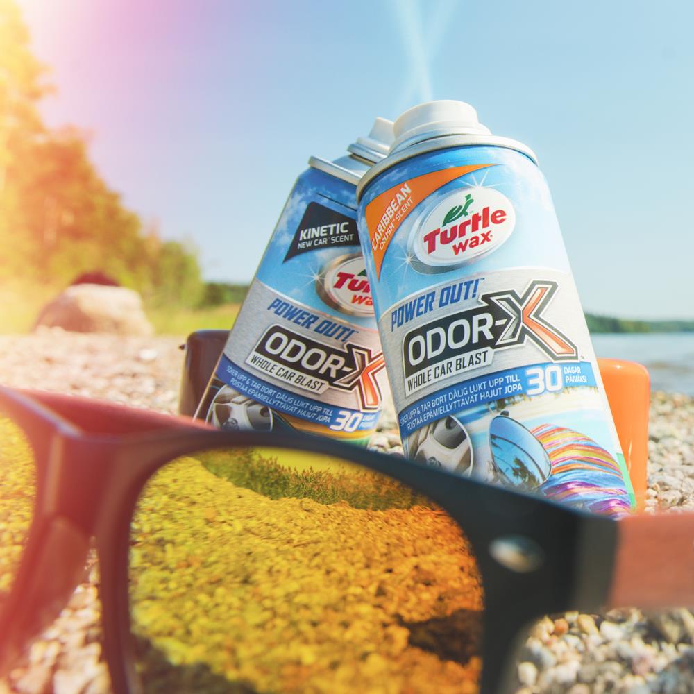Turtle Wax Odor-X Whole Car Blast (100ml) for car odor removal, in Kinetic & Caribbean scents, seen through sunglasses in India.