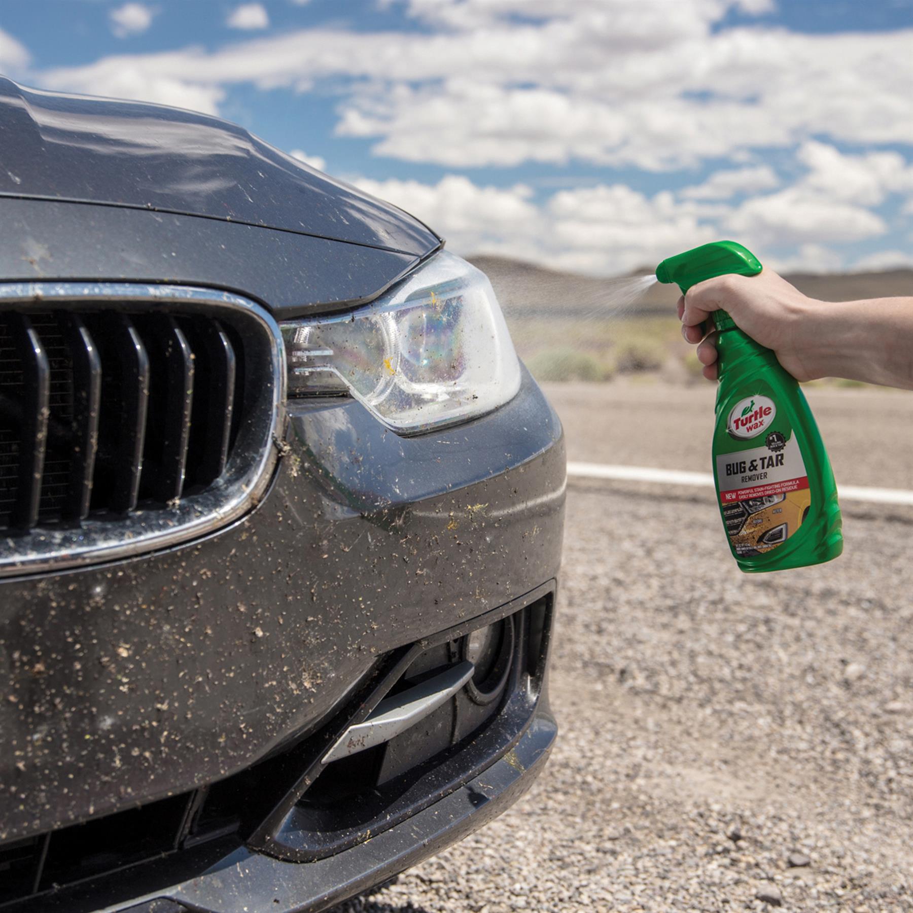 Turtle Wax's Bug & Tar Remover is sprayed on car to clean insect residue. Best for car care, maintenance, and Indian auto owners.